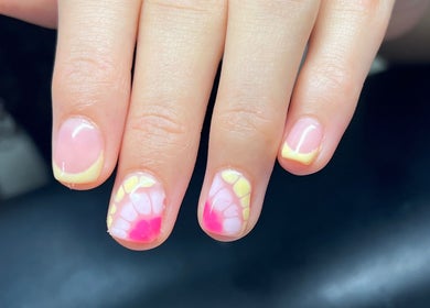 Colorful nail art at Heathers Beauty, Harlow, England, GB showcasing vibrant designs.