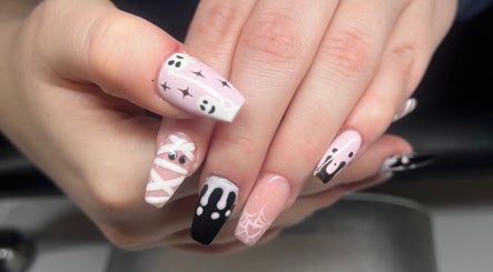 Unique Halloween nail art at Heathers Beauty, Harlow, England, GB showcasing spooky yet chic designs.