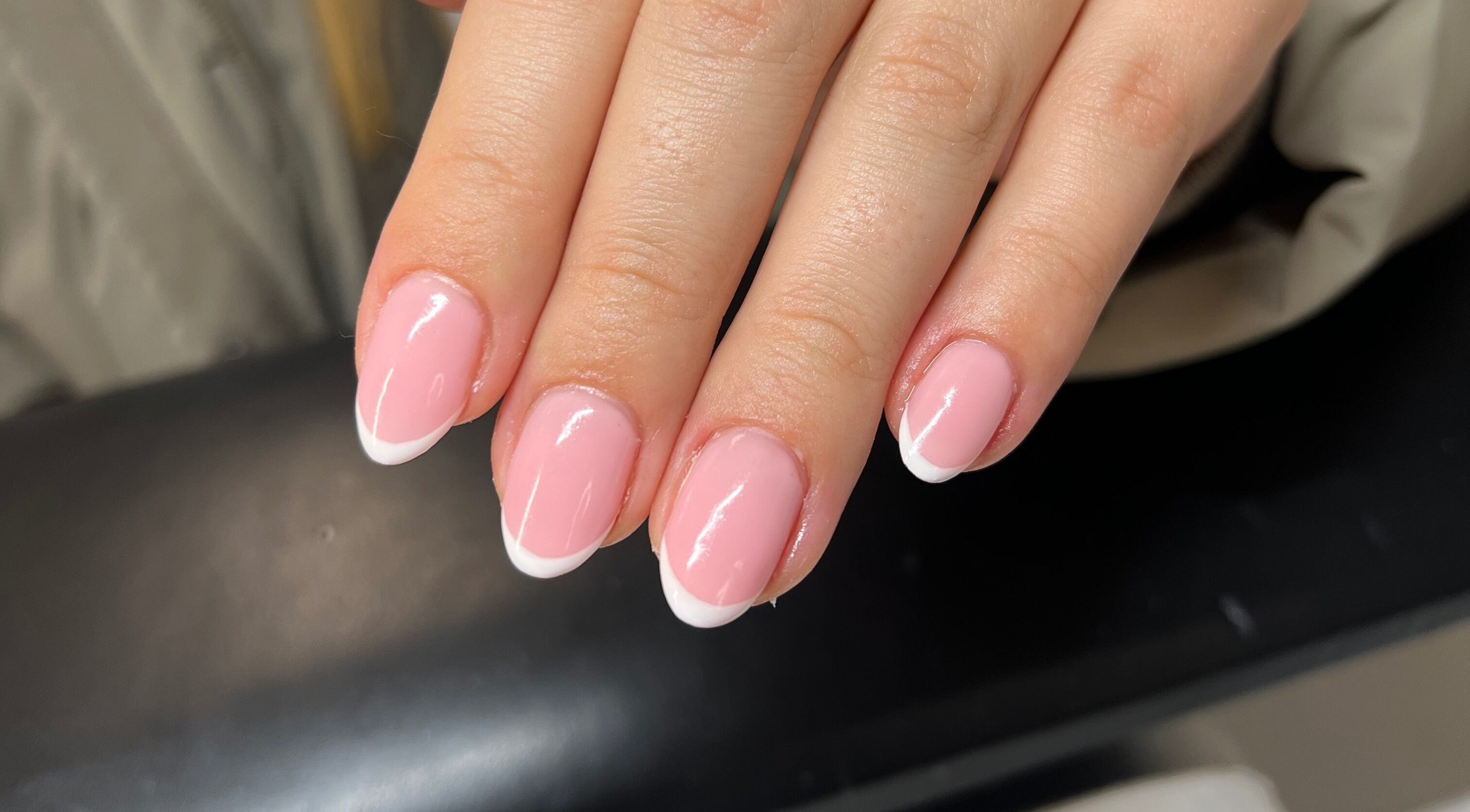 French manicure at Heathers Beauty, Harlow, England, GB showcasing glossy pink nails with white tips.