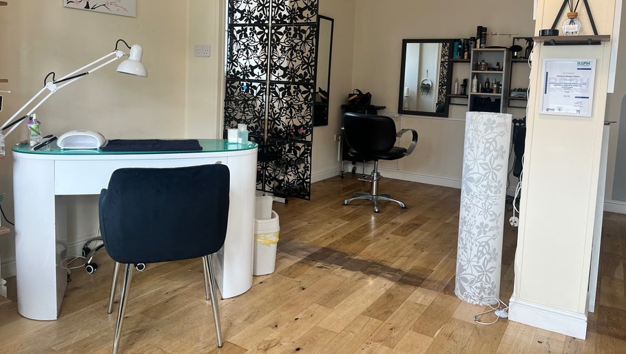 Elegant salon interior at Absolute Salon, Valley, Wales, GB—modern design with a spacious, inviting atmosphere.