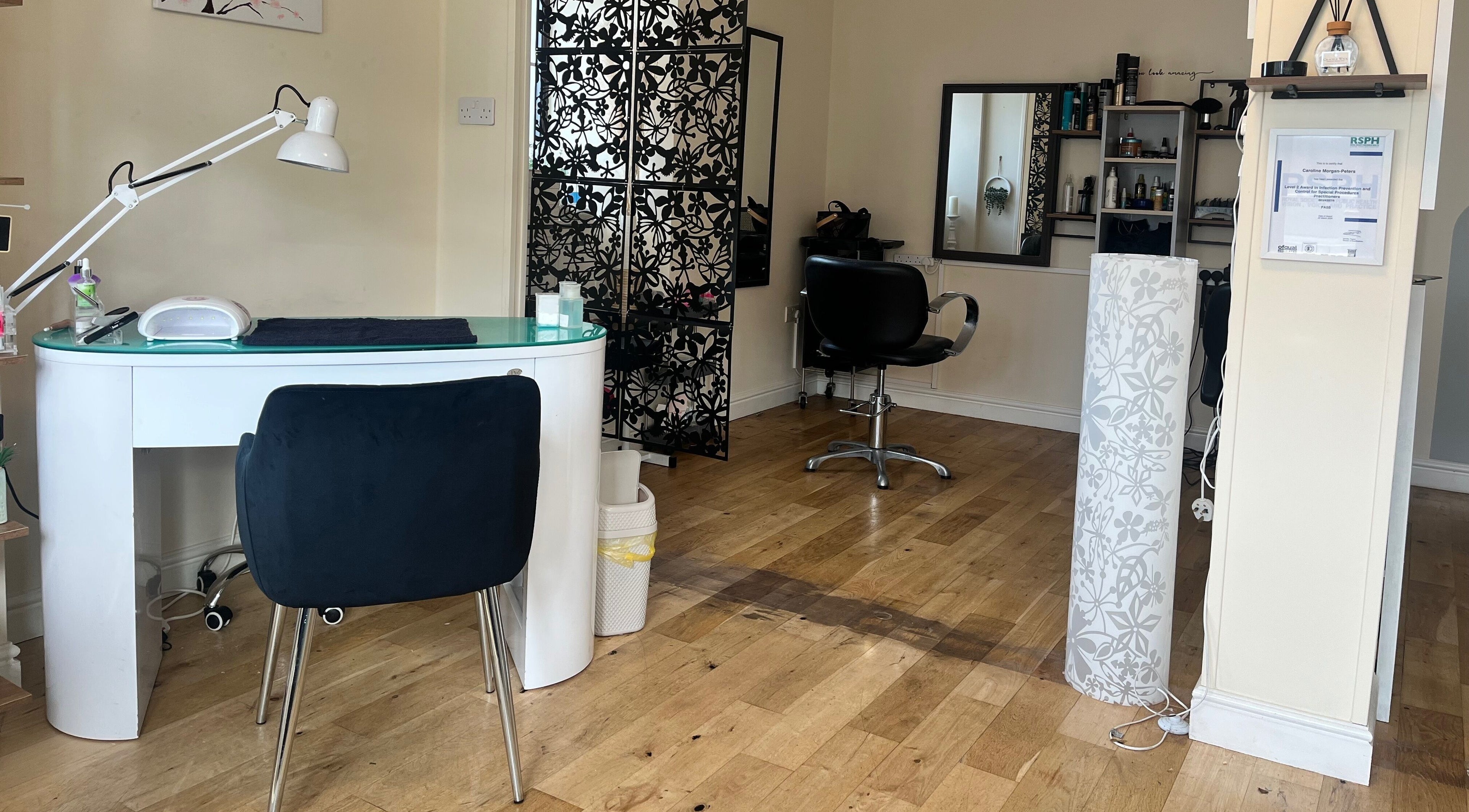 Elegant salon interior at Absolute Salon, Valley, Wales, GB—modern design with a spacious, inviting atmosphere.