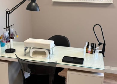 Modern nail station at Cloud Studio, Livingston, Scotland, GB, featuring sleek design with nail products.