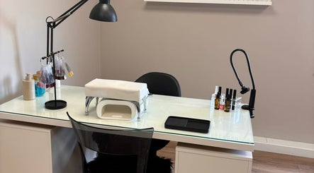 Modern nail station at Cloud Studio, Livingston, Scotland, GB, featuring sleek design with nail products.