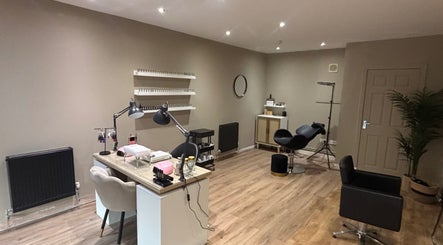 Sophisticated interior of Cloud Studio in Livingston, Scotland, GB, featuring modern salon furniture and decor.