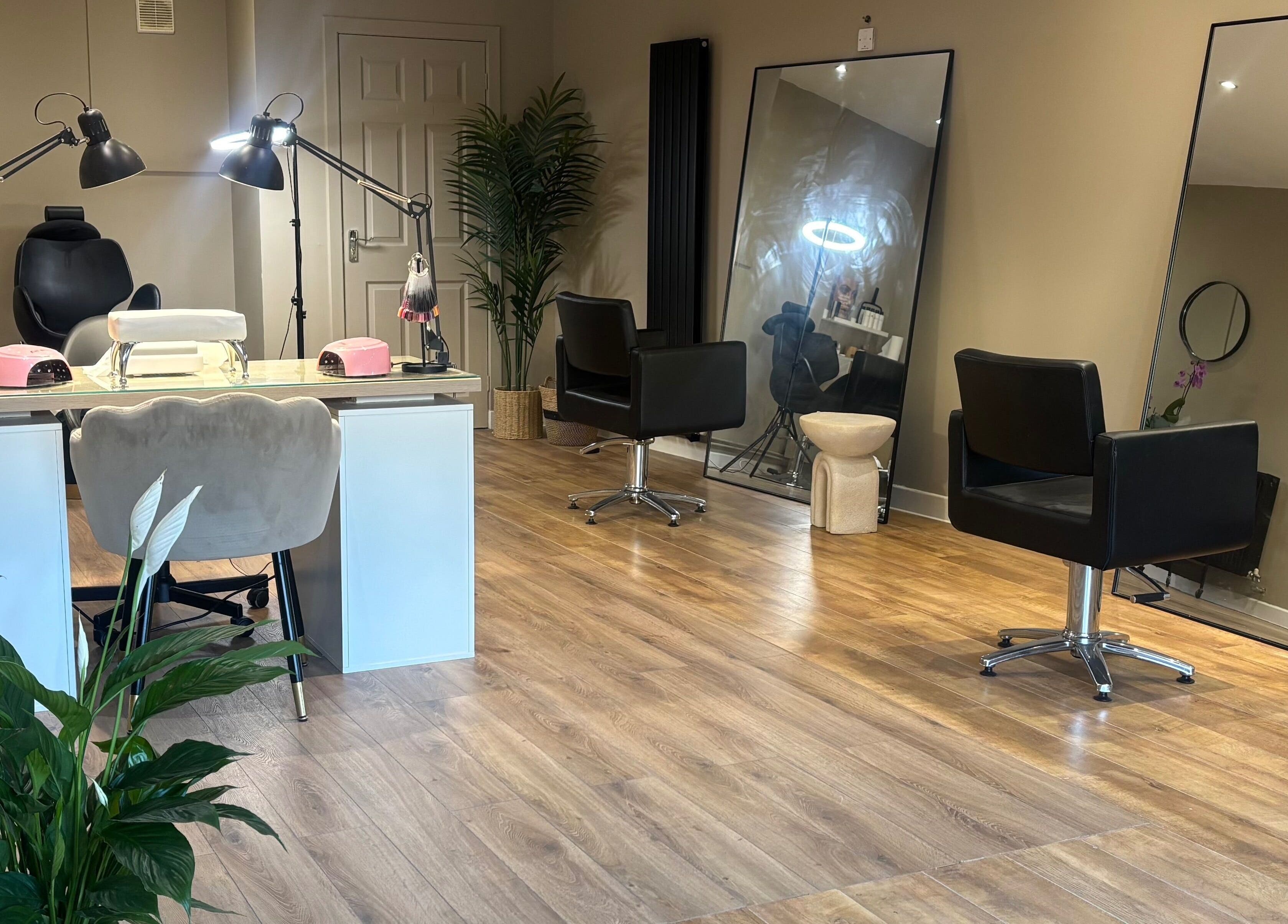 Elegant interior of Cloud Studio in Livingston, Scotland, GB with sleek salon chairs and modern decor.