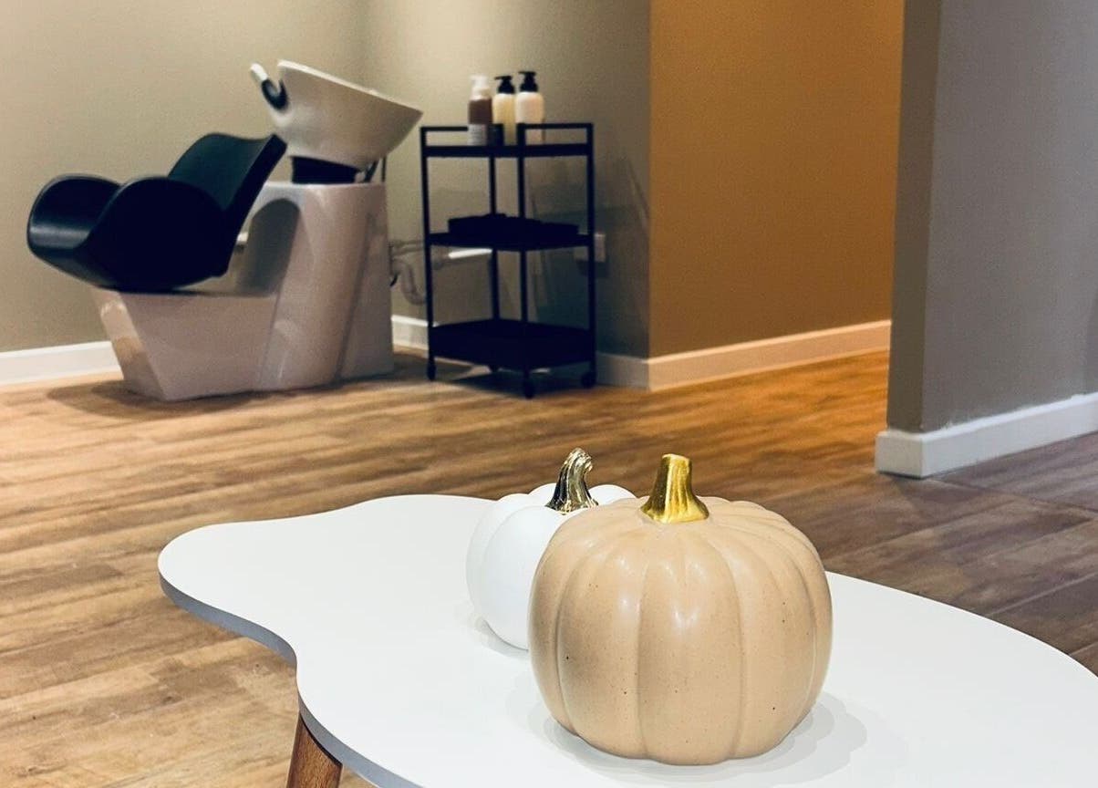 Minimalistic interior of Cloud studio in Livingston, Scotland, GB with a sleek hair washing station and decor.