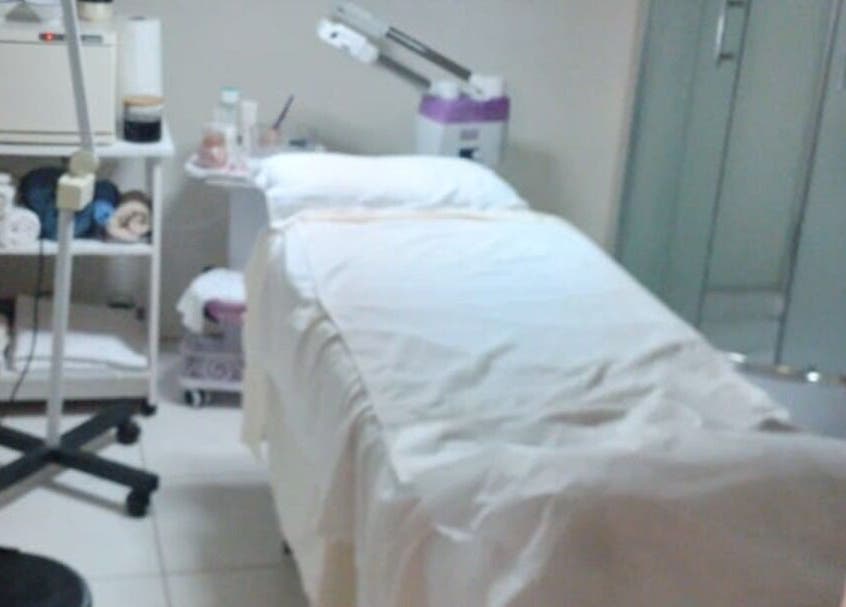 Treatment room at Boom by Sophie - The Spa, Philipsburg, SX featuring a massage table and serene decor.