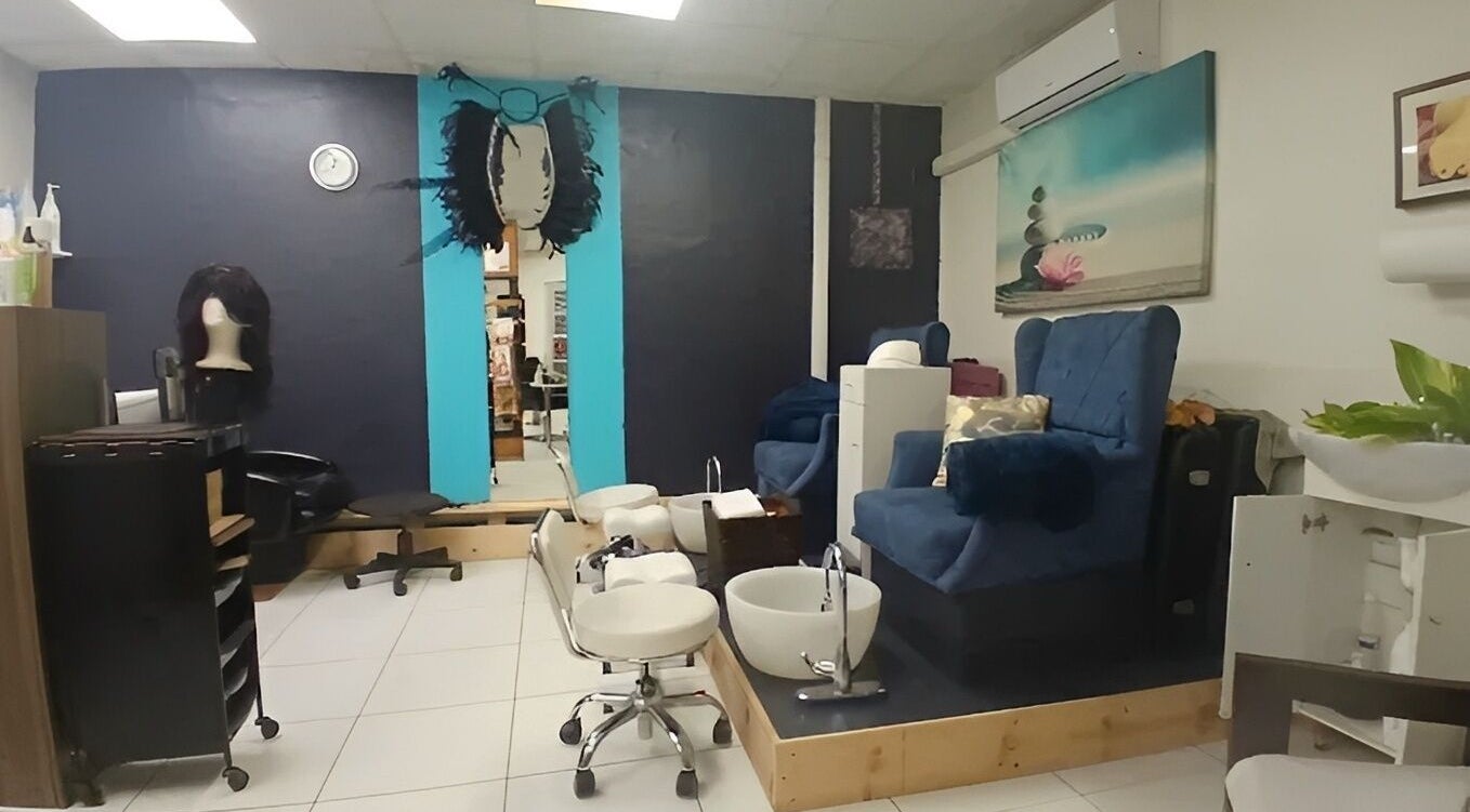 Elegant spa interior at Boom by Sophie - The Spa in Philipsburg, SX, showcasing luxurious seating and decor.