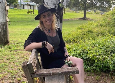 Visitor enjoying the peaceful outdoors at Cobi-Jane Intuitive Connections in Belmont North, New South Wales, AU.
