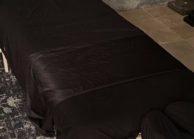 Massage table at ForeverKneaded Massage, Las Vegas, Nevada, US, ready for a relaxing session.
