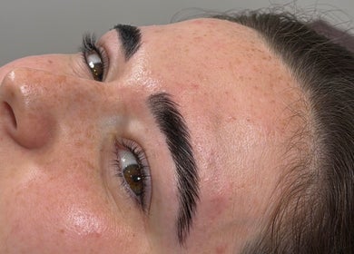 Close-up of perfectly groomed eyebrows at CWL Collective, Glasgow, Scotland, GB.