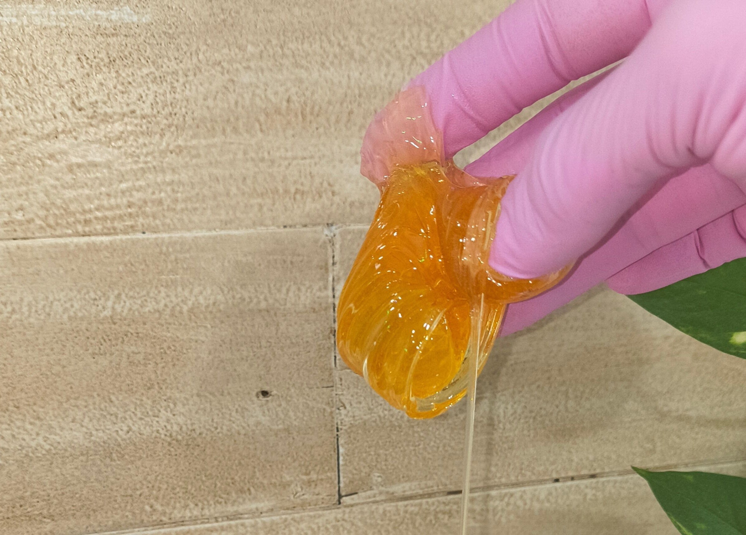 Sugaring paste application at Sugar It Beauty, San Diego, California, US. Experience gentle hair removal.