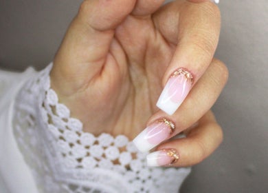 Elegant manicure with pink and gold glitter at Indulge Nails and Beauty Salon, Benoni, Gauteng, ZA.