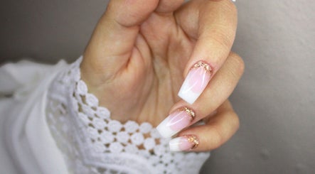 Elegant manicure with pink and gold glitter at Indulge Nails and Beauty Salon, Benoni, Gauteng, ZA.