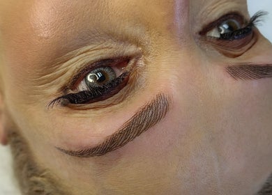 Detailed eyebrow microblading at Indulge Nails and Beauty Salon, Benoni, Gauteng, ZA, showcasing precise artistry.