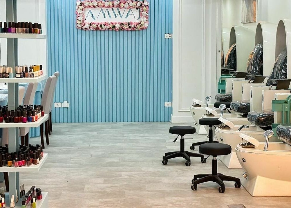 Pedicure chairs and nail polish display at مركز امواج النسائي, Al Qatif, Eastern Province, SA.