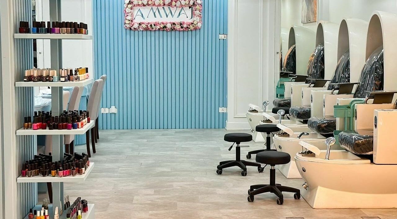 Pedicure chairs and nail polish display at مركز امواج النسائي, Al Qatif, Eastern Province, SA.