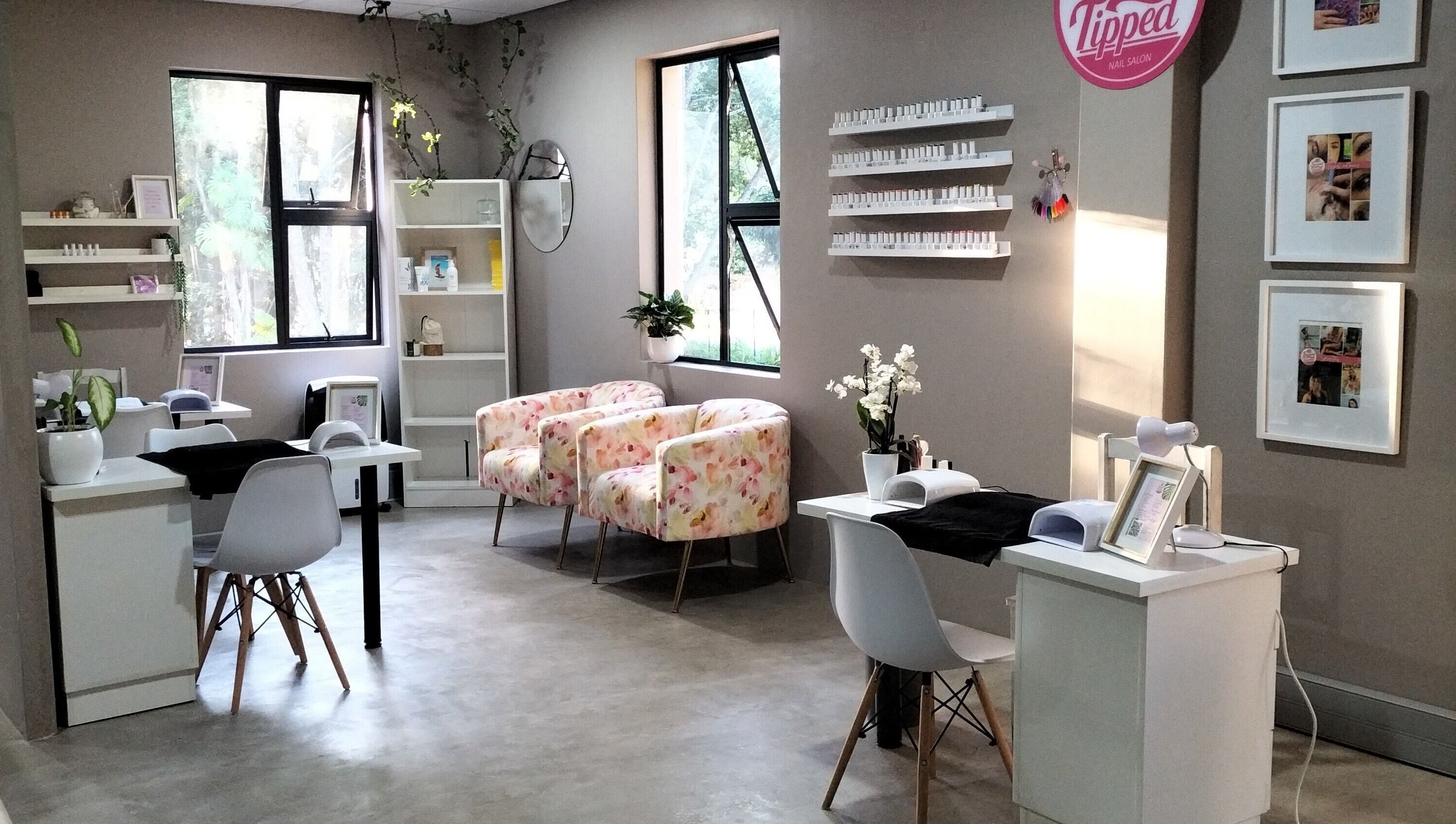 Elegant nail salon interior at Simply Tipped in Gillitts, Kwazulu-natal, ZA, featuring stylish decor.