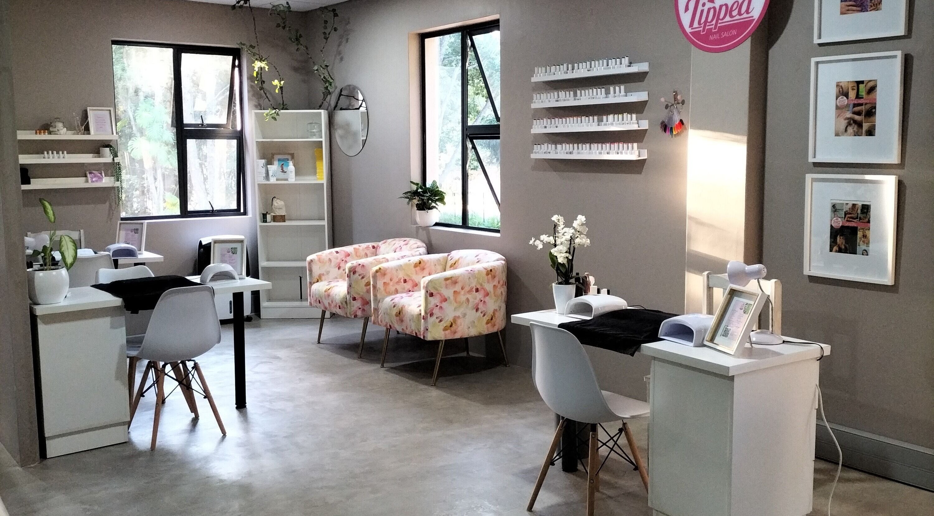Elegant nail salon interior at Simply Tipped in Gillitts, Kwazulu-natal, ZA, featuring stylish decor.