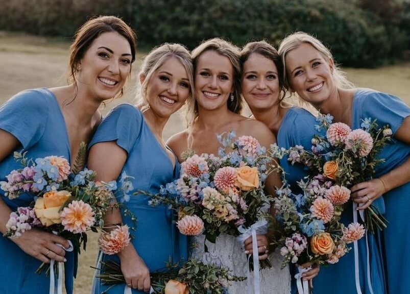 Group of bridesmaids in blue dresses with bouquets at Simply Tipped, Gillitts, Kwazulu-natal, ZA.