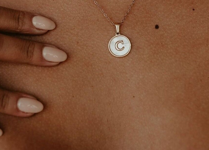 Elegant pendant necklace with manicured nails at Simply Tipped, Gillitts, Kwazulu-natal, ZA.