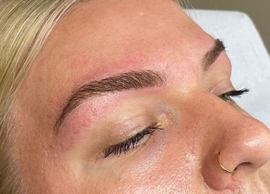Close-up of freshly shaped eyebrows at Scorpio Nails & Beauty, Doncaster, England, GB.