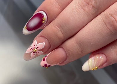 Elegant floral nail art design at Scorpio Nails & Beauty in Doncaster, England, GB, showcasing unique artistry.