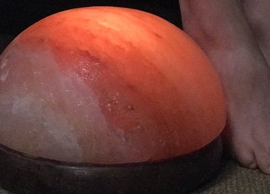 Warm Himalayan salt lamp at Green Room Remedies, Get Me Some Green, Matthews, NC, US provides soothing ambiance.