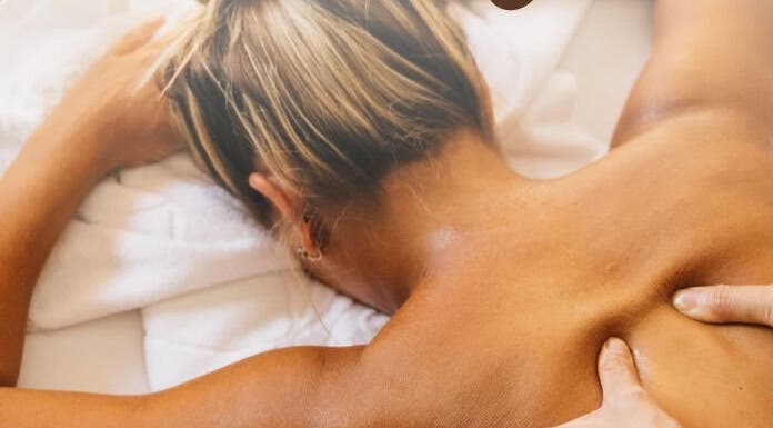 Woman receiving a soothing back massage at Beauty Fennique, Carindale, Queensland, AU.