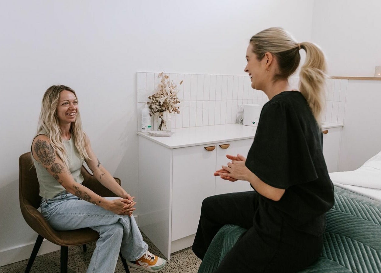 Client and therapist in comforting consultation at Numaven, Merewether, New South Wales, AU.