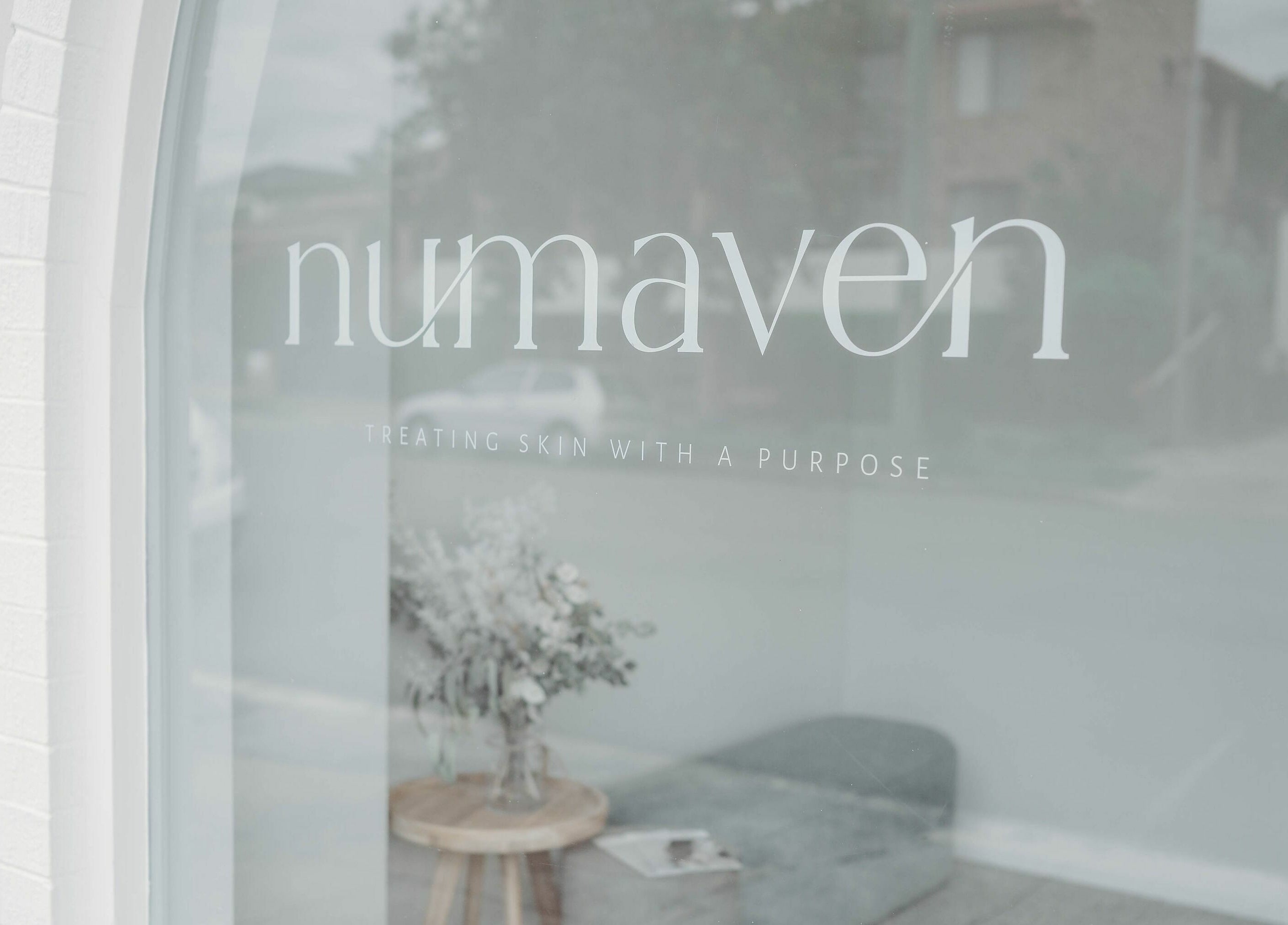 Entrance of Numaven with window sign, located in Merewether, New South Wales, AU.