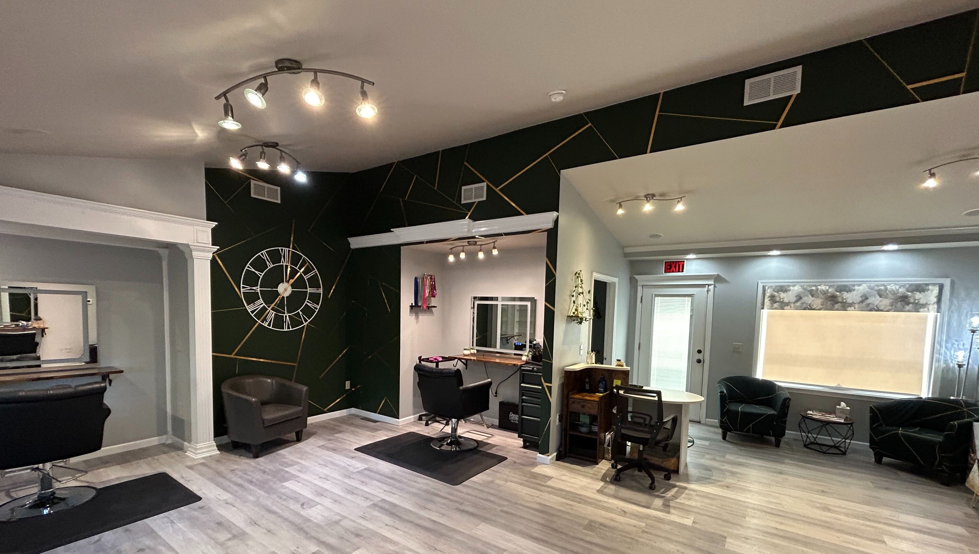 Modern salon interior at Emerald Salon, Harrisonville, Missouri, US with elegant design and stylish furnishings.