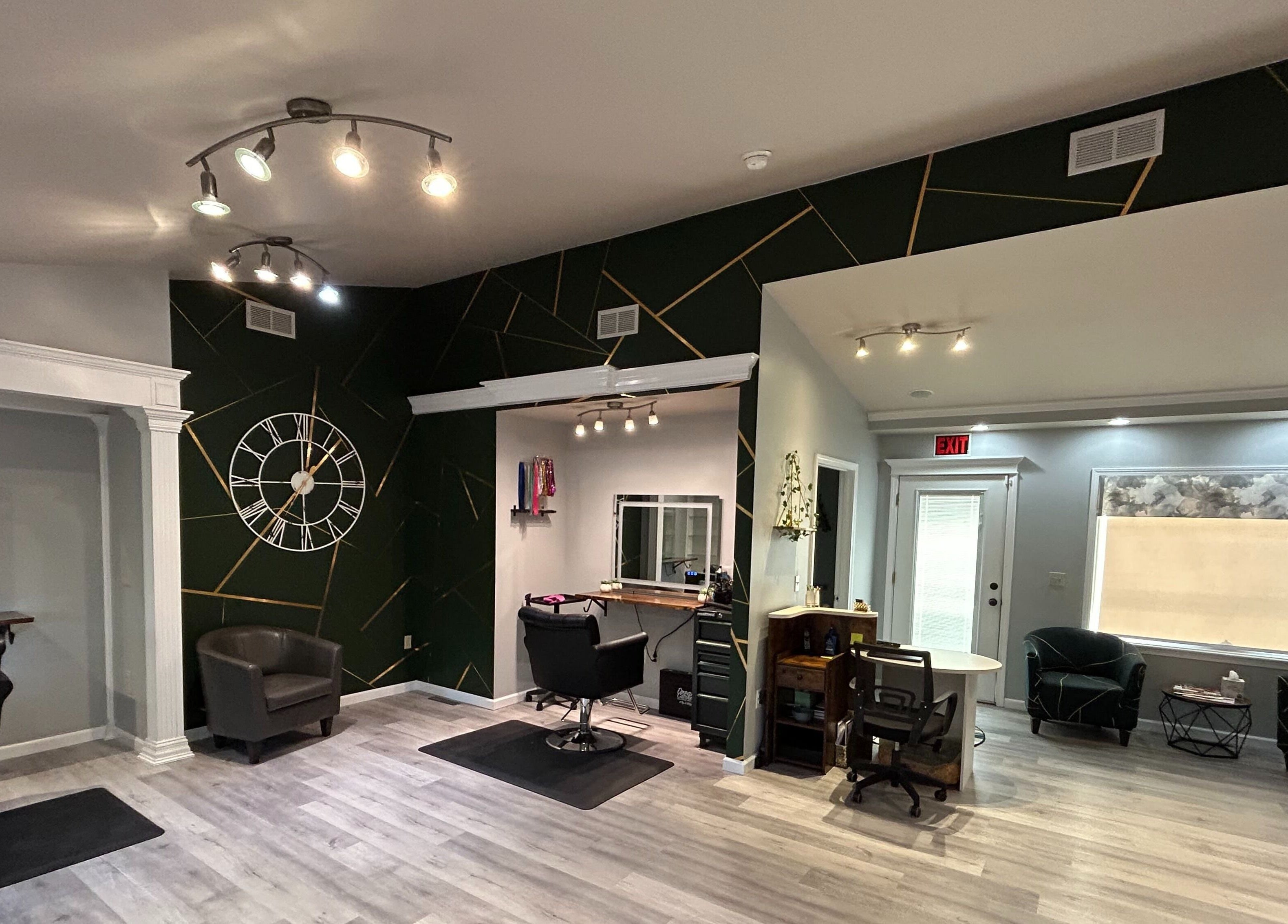 Modern salon interior at Emerald Salon, Harrisonville, Missouri, US with elegant design and stylish furnishings.