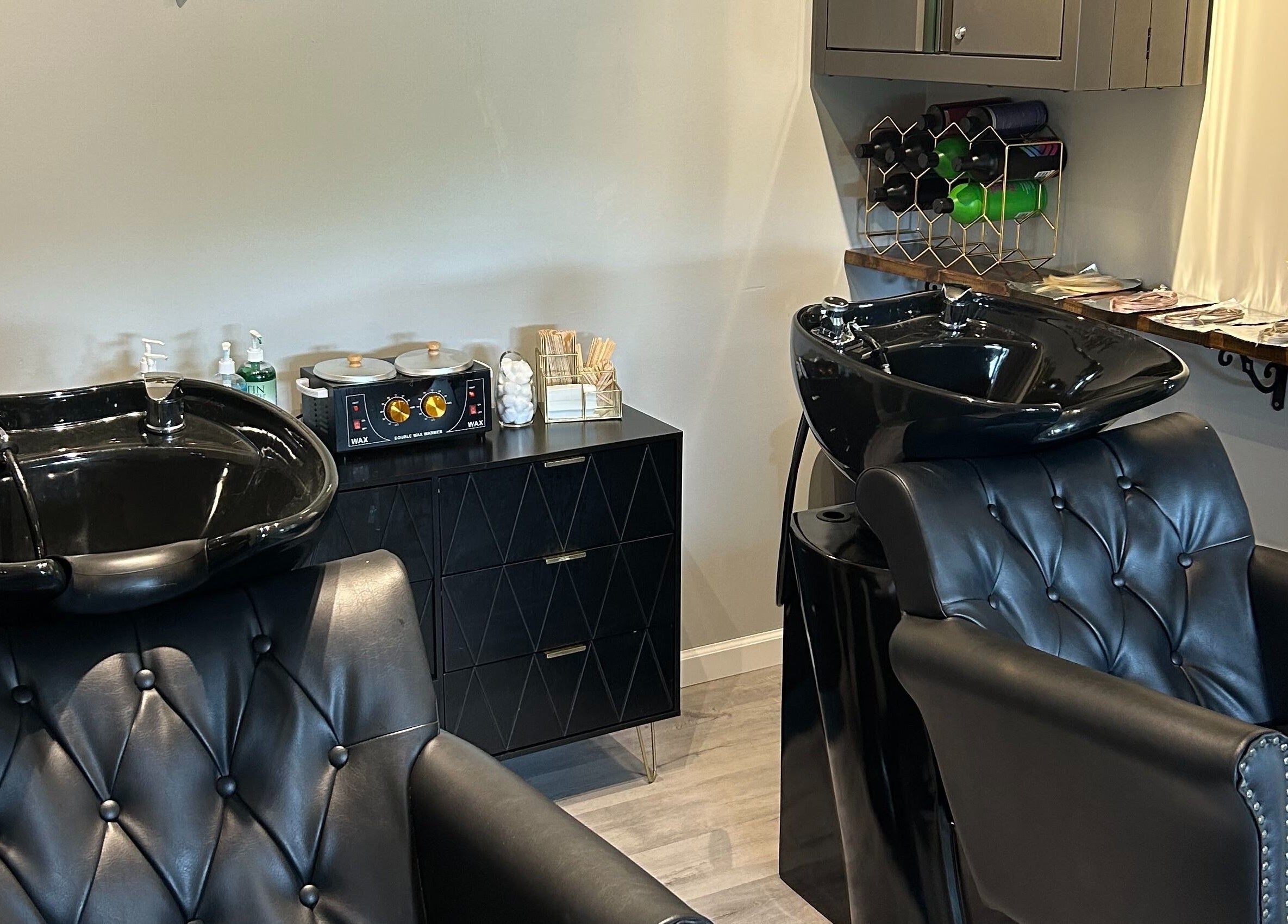 Elegant salon wash stations at Emerald Salon, Harrisonville, Missouri, US offering luxury beauty experiences.