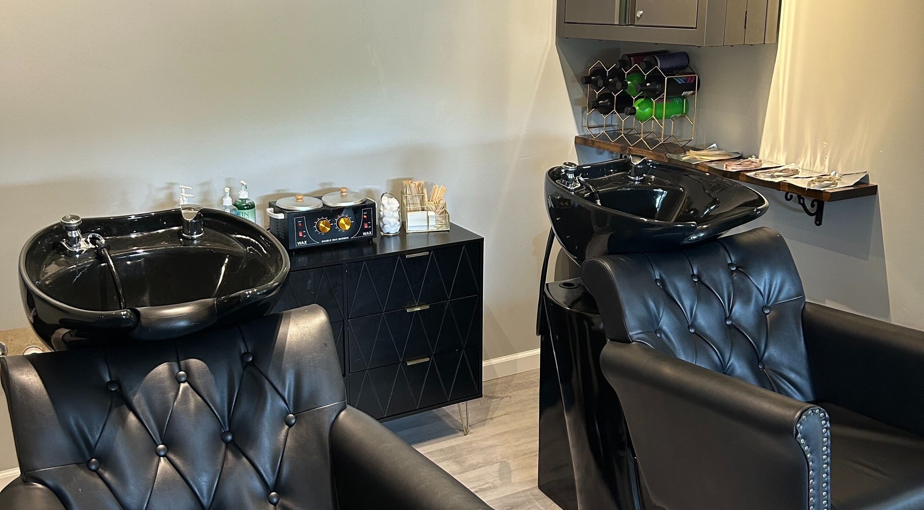 Elegant salon wash stations at Emerald Salon, Harrisonville, Missouri, US offering luxury beauty experiences.