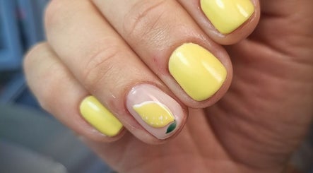Lemon nail art design at Bee You Nails, Warsash, England, GB, featuring vibrant yellow polish.