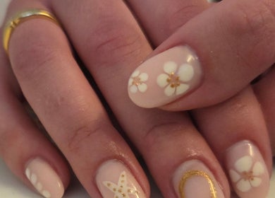 Elegant floral nail design at Bee You Nails, Warsash, England, GB. Perfect for special occasions.