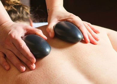 Relaxing hot stone massage at Nadine Louise in Salisbury, England, GB.
