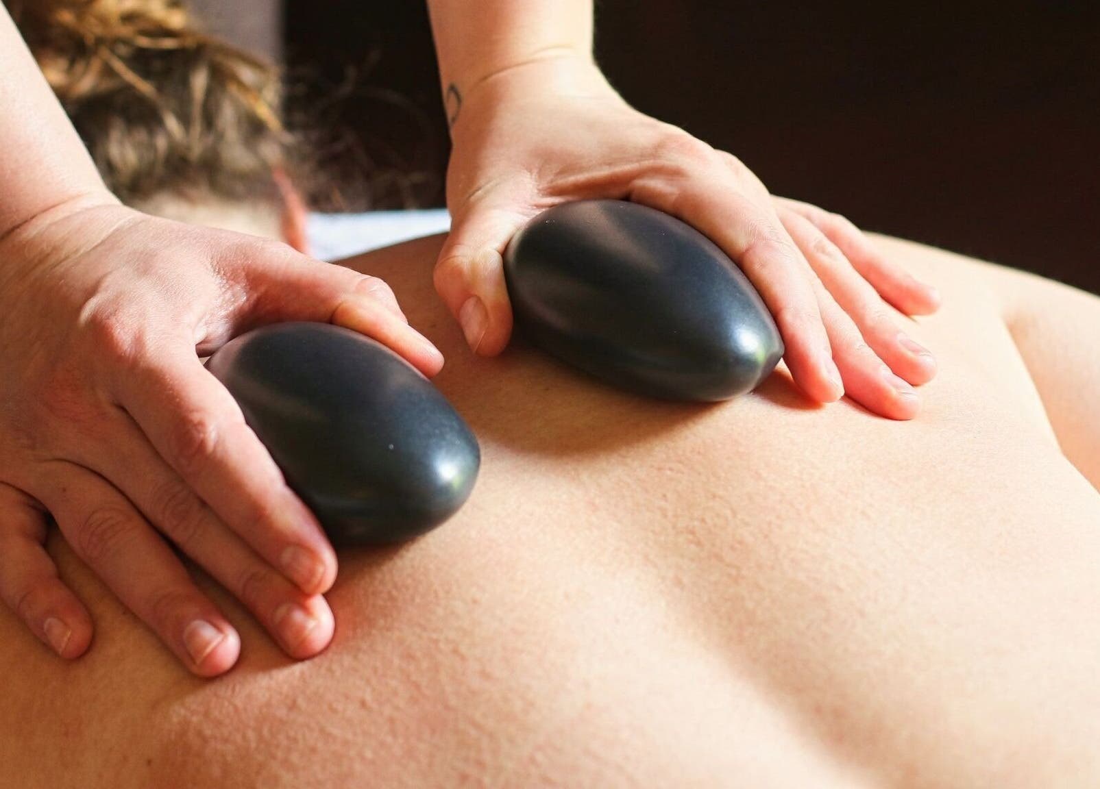 Relaxing hot stone massage at Nadine Louise in Salisbury, England, GB.
