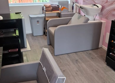 Stylish salon wash area at H Gcreativehair in Plymouth, England, GB, featuring modern equipment and comfortable chairs.