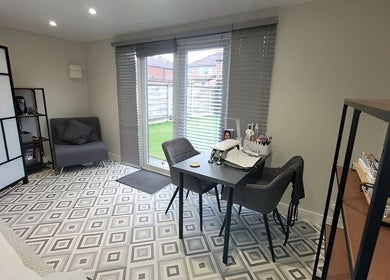 Modern beauty treatment room at Beauty by Leanne, Timperley, England, GB with chic decor and relaxing ambiance.