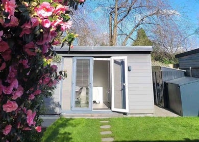 Garden view of Beauty by Leanne in Timperley, England, GB with blooming pink flowers.