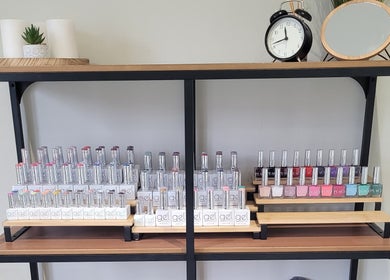 Stylish nail polish rack at Beauty by Leanne, Timperley, England, GB offering a vibrant selection.