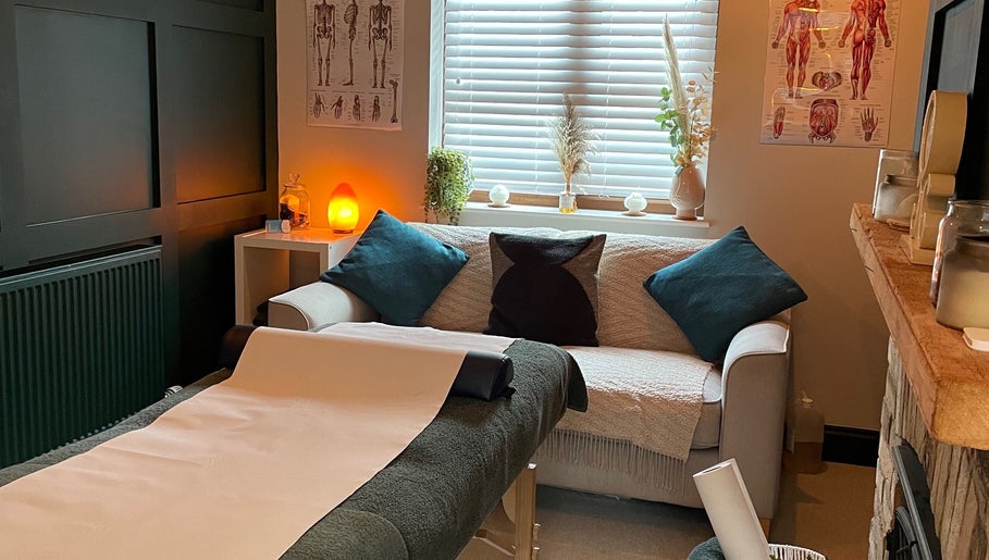 Cozy massage area at Pembrokeshire Sports Massage, Begelly, Wales, GB with serene ambiance and decor.