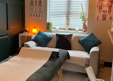 Cozy massage area at Pembrokeshire Sports Massage, Begelly, Wales, GB with serene ambiance and decor.