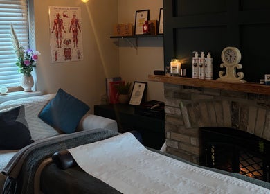 Relaxing massage room at Pembrokeshire Sports Massage in Begelly, Wales, GB with a cozy ambiance.