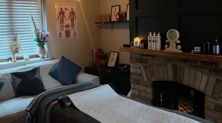 Relaxing massage room at Pembrokeshire Sports Massage in Begelly, Wales, GB with a cozy ambiance.