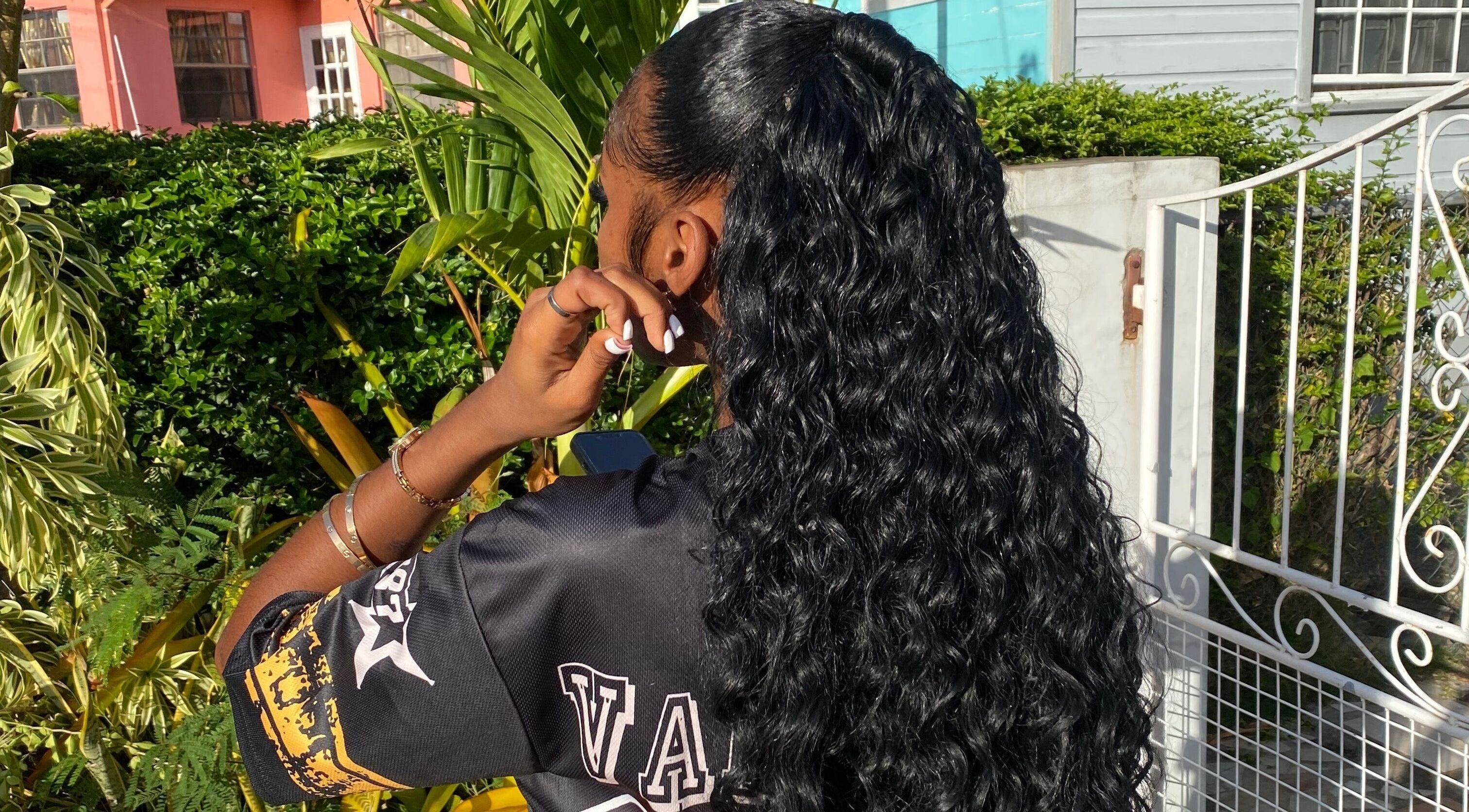 Elegant curly hairstyle at Flux Beauty in Oistins, Christ Church, BB, showcasing professional hair care.