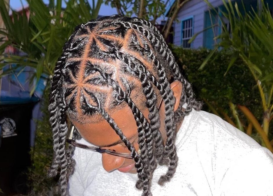 Intricate braids at Flux Beauty in Oistins, Christ Church, BB showcase expert styling.