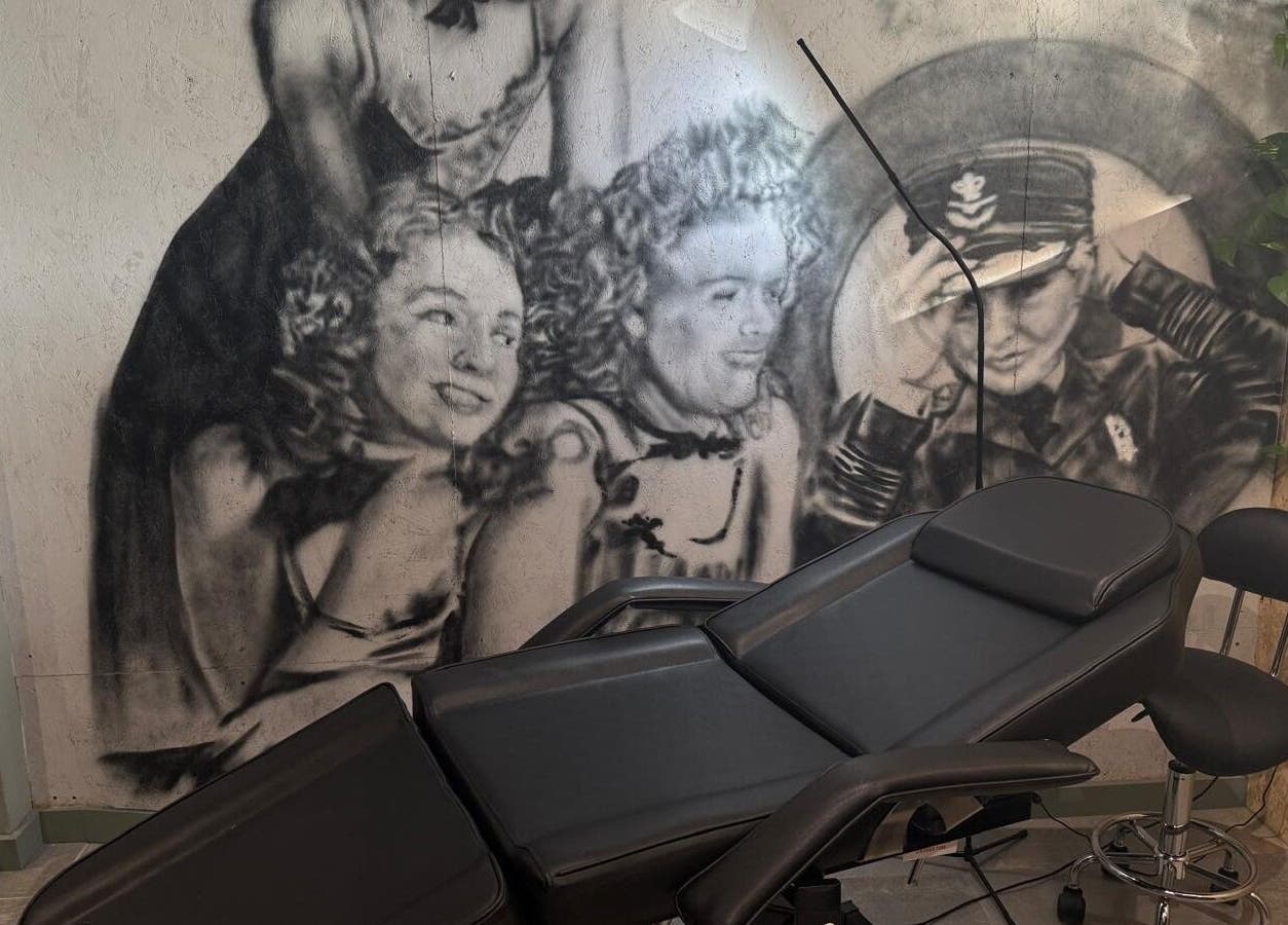 Relaxing spa chair in Belle & Bee Beauty X Henlow, Henlow Camp, England, GB, with artistic wall mural.